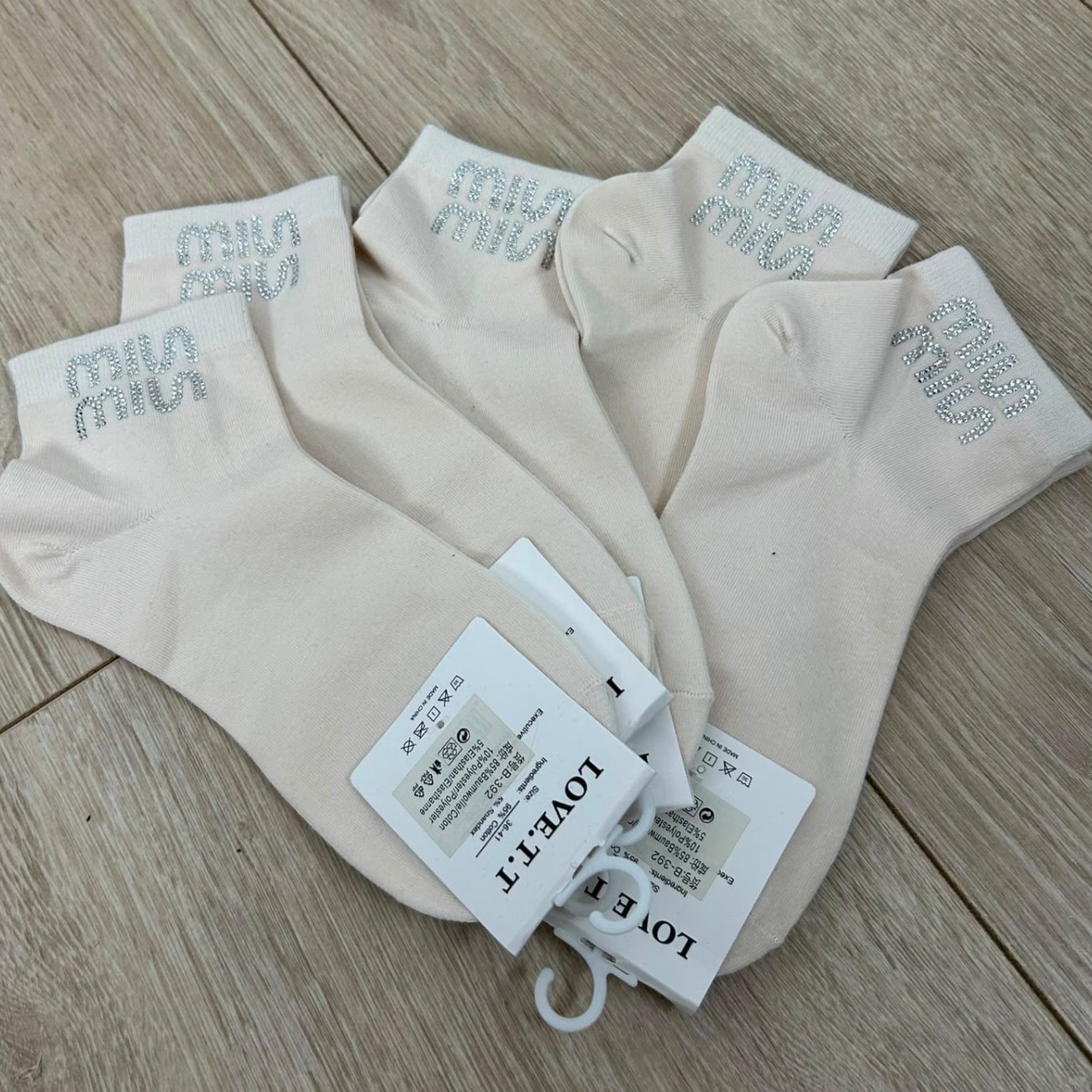 Socken mit Glitzer-Schriftzug